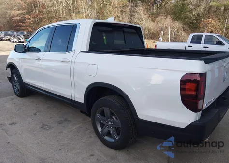 2023 Honda Ridgeline Rtl z USA, uszkodzony, nr VIN 5FPYK3F59PB049251